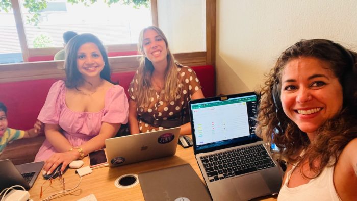 Velocity global colleagues co-working together in Spain