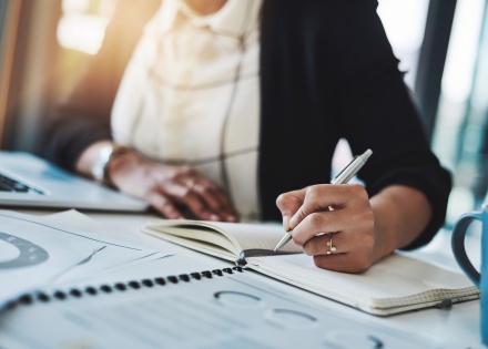 Remote worker examining their 13th month payment