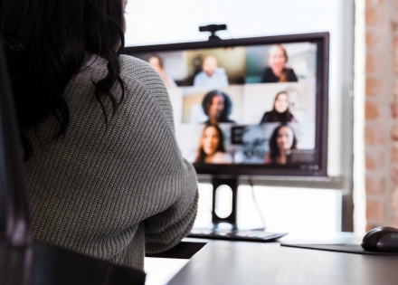 Remote employee attending a video meeting