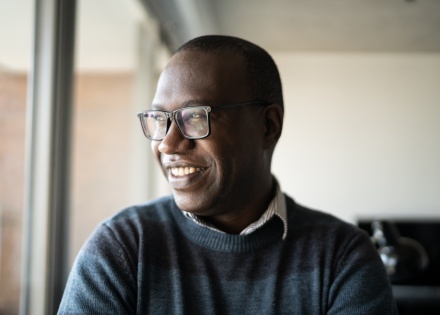 Male business leader showing feelings of confidence and security after converting contractors to employees