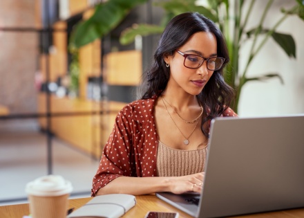 Woman working remotely on laptop