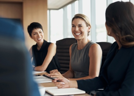 Coworkers discuss how to get legal work authorization in Germany