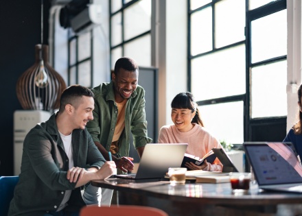 Three global HR team members discussing Argentina work visas