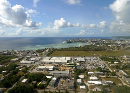 Aerial view of Guam with the ocean in the background