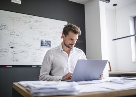 HR manager researching the best payroll service for small businesses