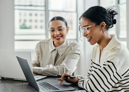 HR team members discussing HR compliance strategy for international teams