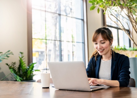 Global HR manager researching performance improvement plans for remote employees