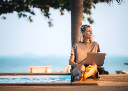 Businesswoman analyzing and fixing salary compression at a pool