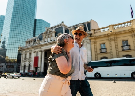 Happy couple strolling through the streets of Santiago Chile