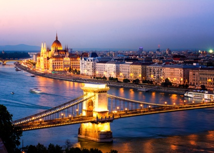 Hungarian Parliament at dusk by the Danube in Hungary