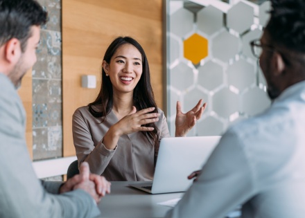 Global HR team discussing temporary visas vs permanent visas