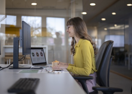 HR manager smiles while building an HR tech stack