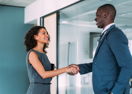 Employees meeting to discuss average salaries in Trinidad and Tobago