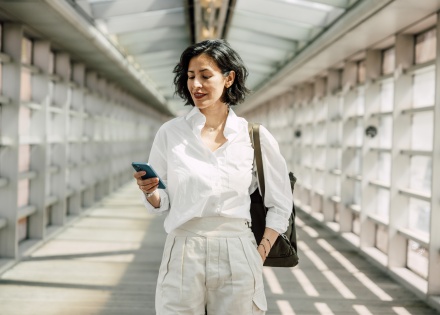 Global HR manager reading about how to hire in Gabon