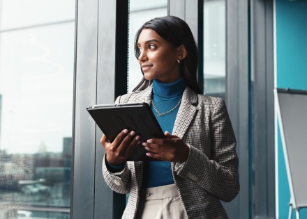 HR manager reading about how to hire in Estonia