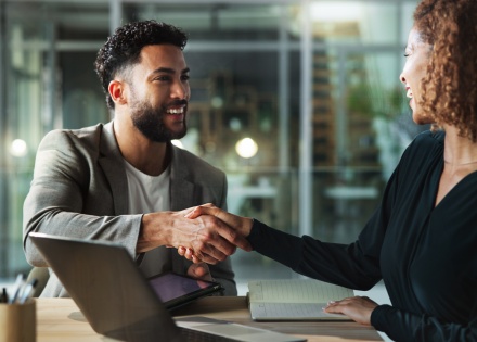 HR team members meeting to discuss hiring in Rwanda
