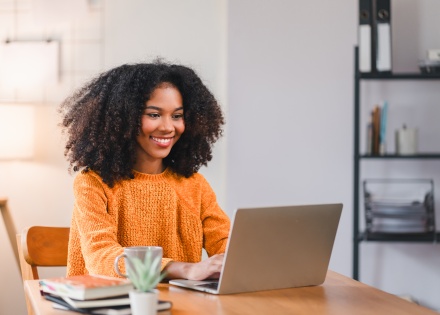 Woman using a laptop while working from home in Bolivia