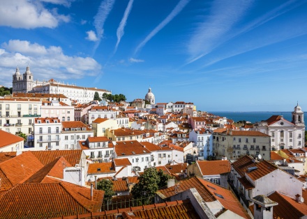 Panoramic view of the red rooftops and white buildings of Lisbon Portugal