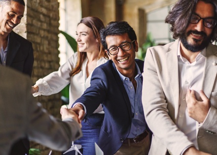 Business professionals celebrating workplace culture in the Philippines