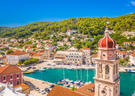 Pucisca on Brac Island with church bell tower and seaside village