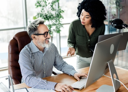 Global HR managers discussing payroll tax in Ecuador