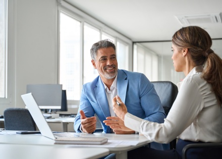 Global HR managers discussing payroll tax in Finland