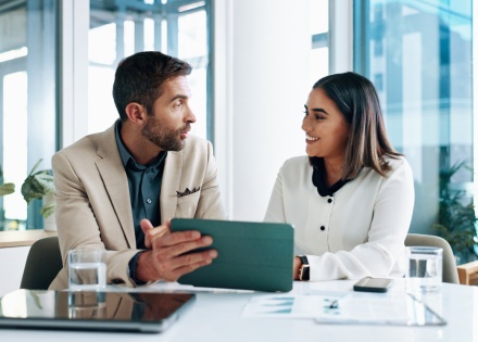 HR managers discussing the average salary in Gabon