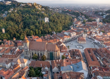 Aerial view of Brasov’s old town and church in Romania