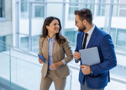 Business colleagues collaborating and discussing payroll tax in Cyprus