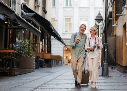 Couple enjoying a leisurely walk during an Italian public holiday