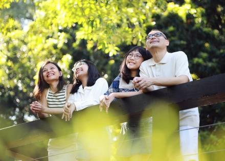 Family outside enjoying nature together during a public holiday in the Cayman Islands