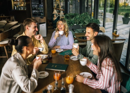 Friends having coffee together on a terrace during Turkmenistan’s public holidays