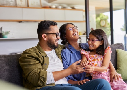 Family at home laughing and enjoying a Filipino public holiday