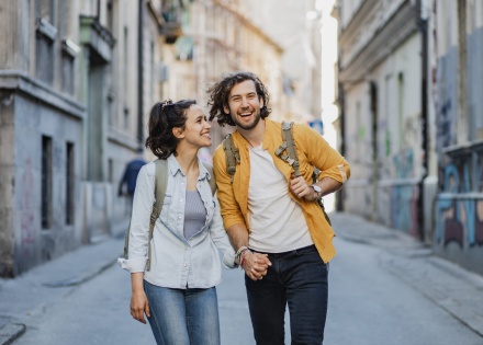 Couple walking down a street enjoying Armenia’s public holidays