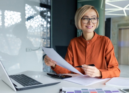Accounts payable specialist working inside the office with documents