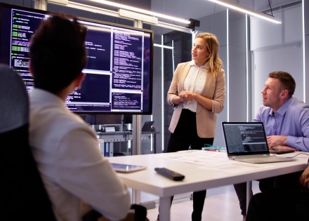 Global HR team discussing how to outsource prompt engineers