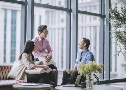 Global HR managers discussing business culture in Laos