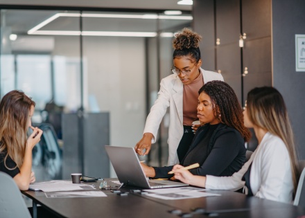 Group of women working together in a modern office