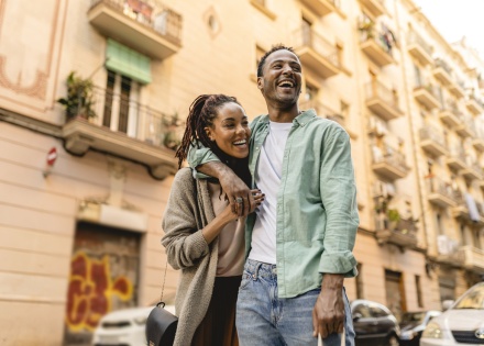 Smiling couple in a street enjoying Nigeria’s public holidays