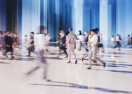People walking on busy spot, going into different directions