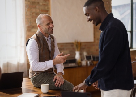 Manager discussing bereavement leave with an employee in a supportive office conversation.