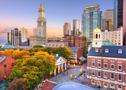 Skyline at dusk with historic and modern buildings, illustrating nearshoring.