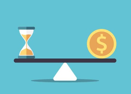 Coin and hour glass balancing on a scale