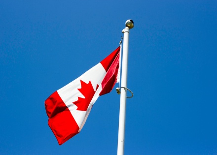 Canadian flag on a flag pole