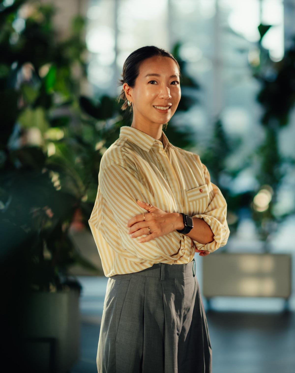 Woman in the finance industry confident after working with Pebl EOR.