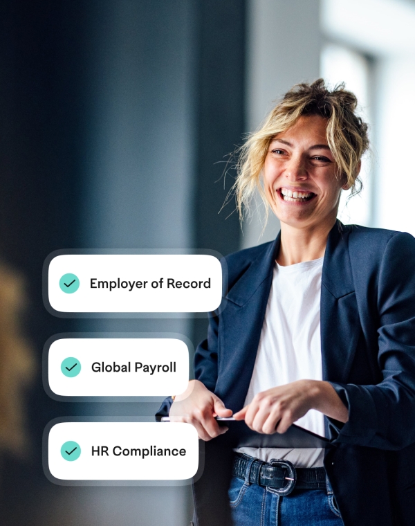 Woman holding a tablet with UI of employer of record, global payroll, and HR compliance layered on time.