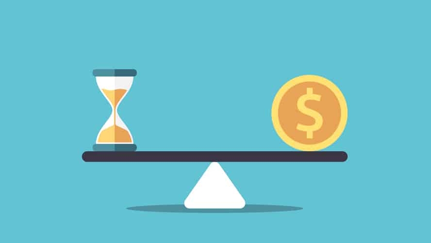Coin and hour glass balancing on a scale