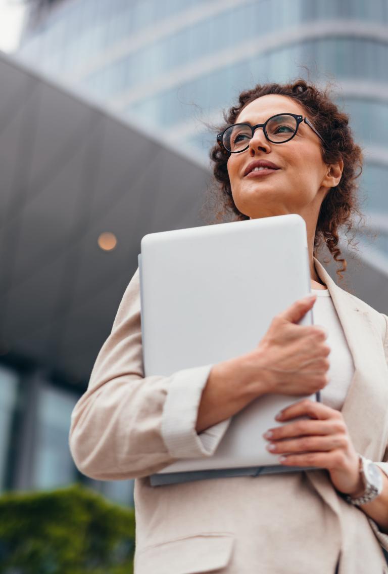 Professional businesswoman feeling confident regarding EOR global expansion.