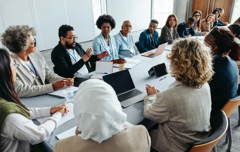 people-brainstorming-and-strategizing-in-a-meeting.jpg