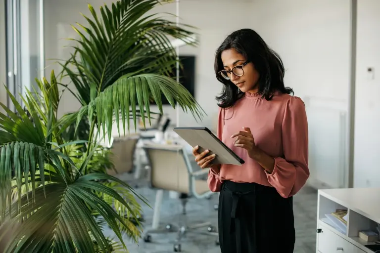 Businesswoman-Using-Digital-Tablet-in-Office.jpg